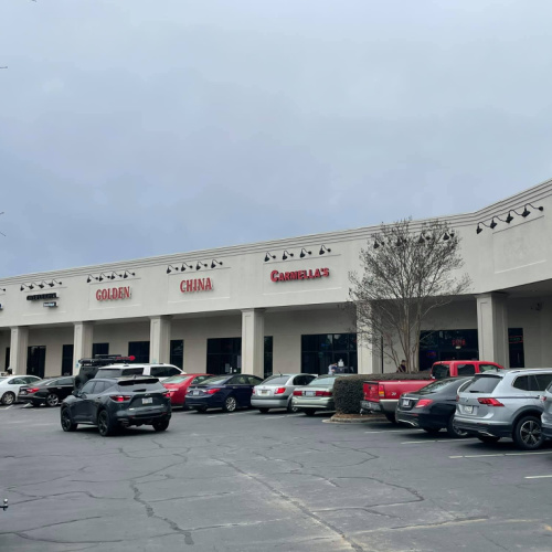 commercial exterior painting of retail plaza by North Carolina painting company in Charlotte, SouthEnd Painting and Roofing Contractors