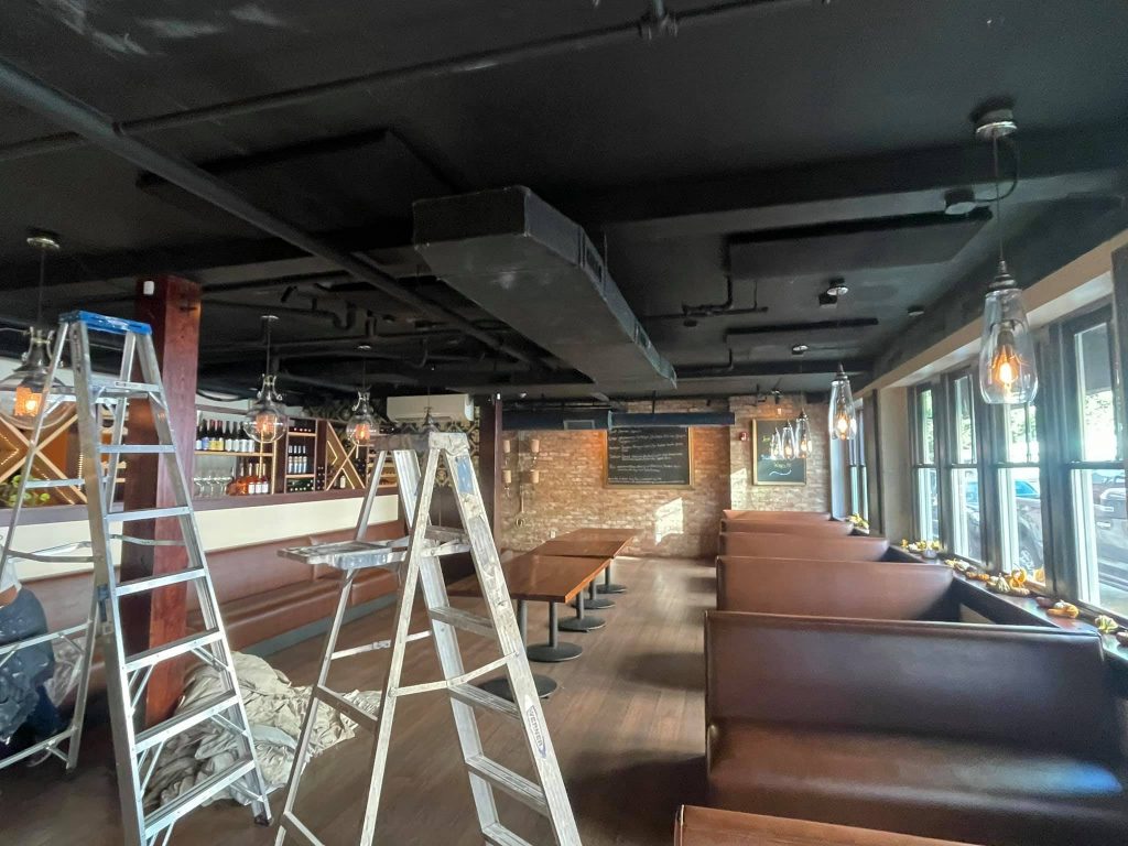 Interior renovations in a restaurant by SouthEnd Painting and Roofing Contractors